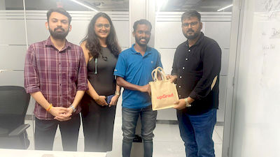 upGrad Ahmedabad office - student and parents with the counselling team after their study abroad session